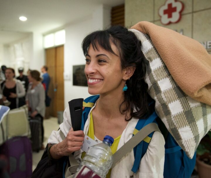 A humanitarian with a large backpack while traveling